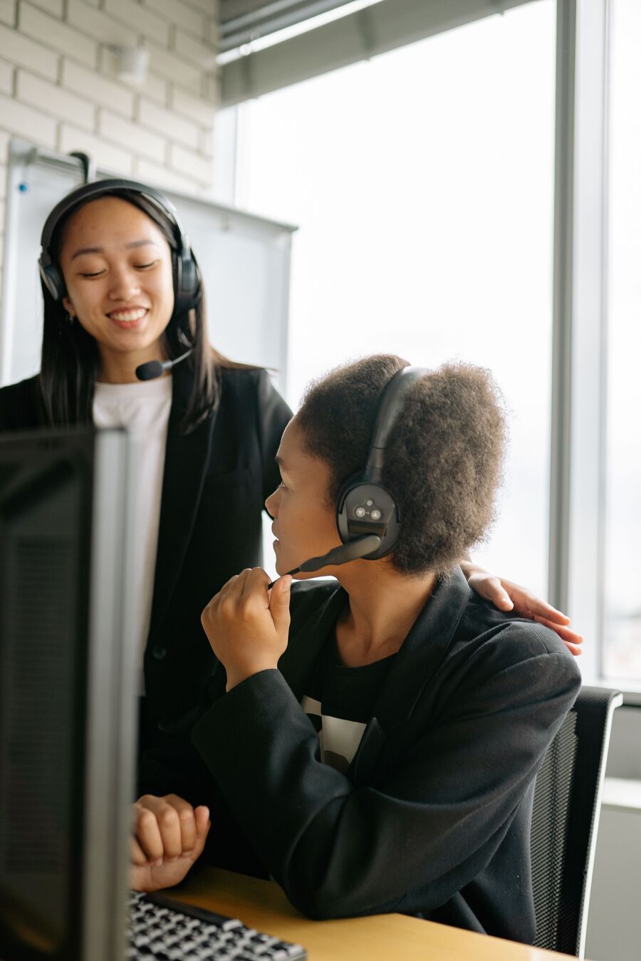 Friendly customer support agent wearing a headset